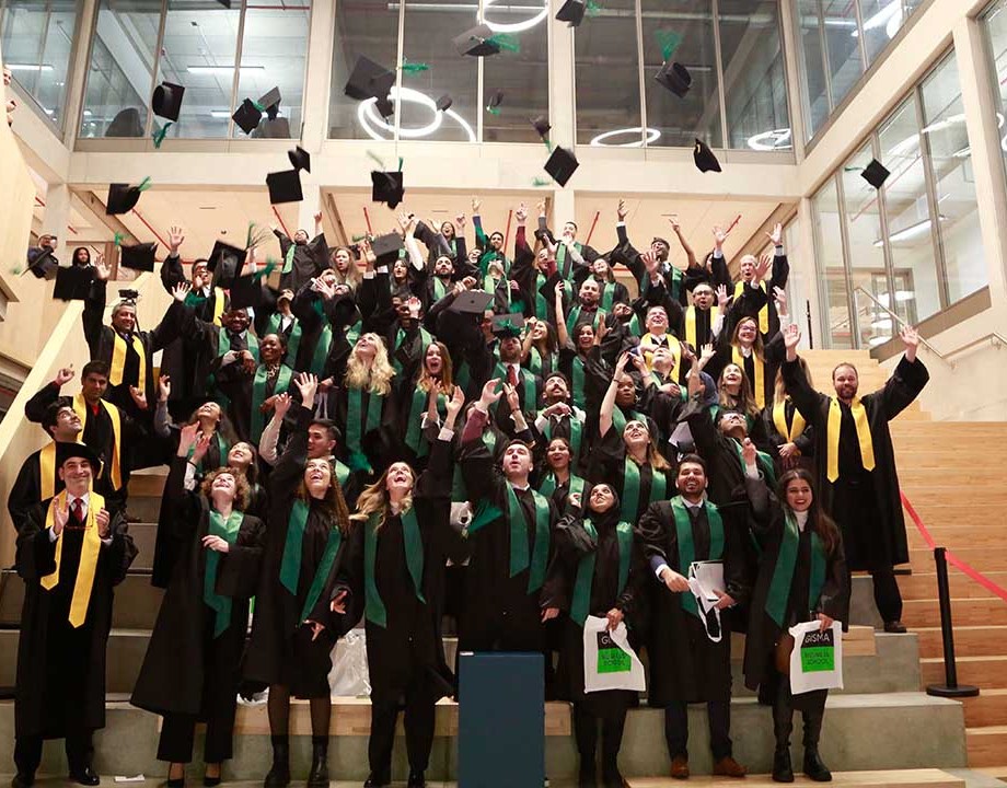 a group of graduates celebrating